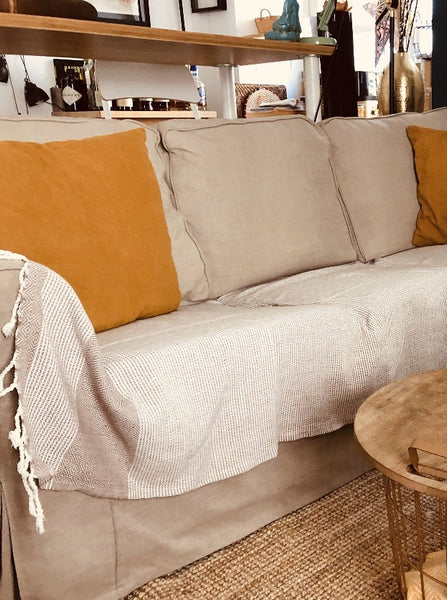 Covering a sofa with a throw sale